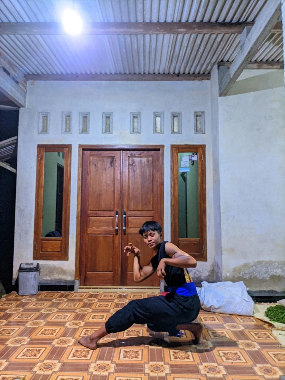 (Masterpiece, Best quality, 18 year old boy, 8k, ultra-detailed), (underneath, looking away, upper body, warm eyes, thin lips), 1 boy, solo, Young, (ager), (Dark Short straight hair, under cut), black eyes, full bodyesbian, (Shirtless), topless, Green headband, sandals, (Black shorts with loincloth), (Depth of field:1.2), (Abs), (chest), (upper arms), black wristband, (topless male), man with martial arts stance, athretic body, kneeling pose, inside caves, (foggy night)