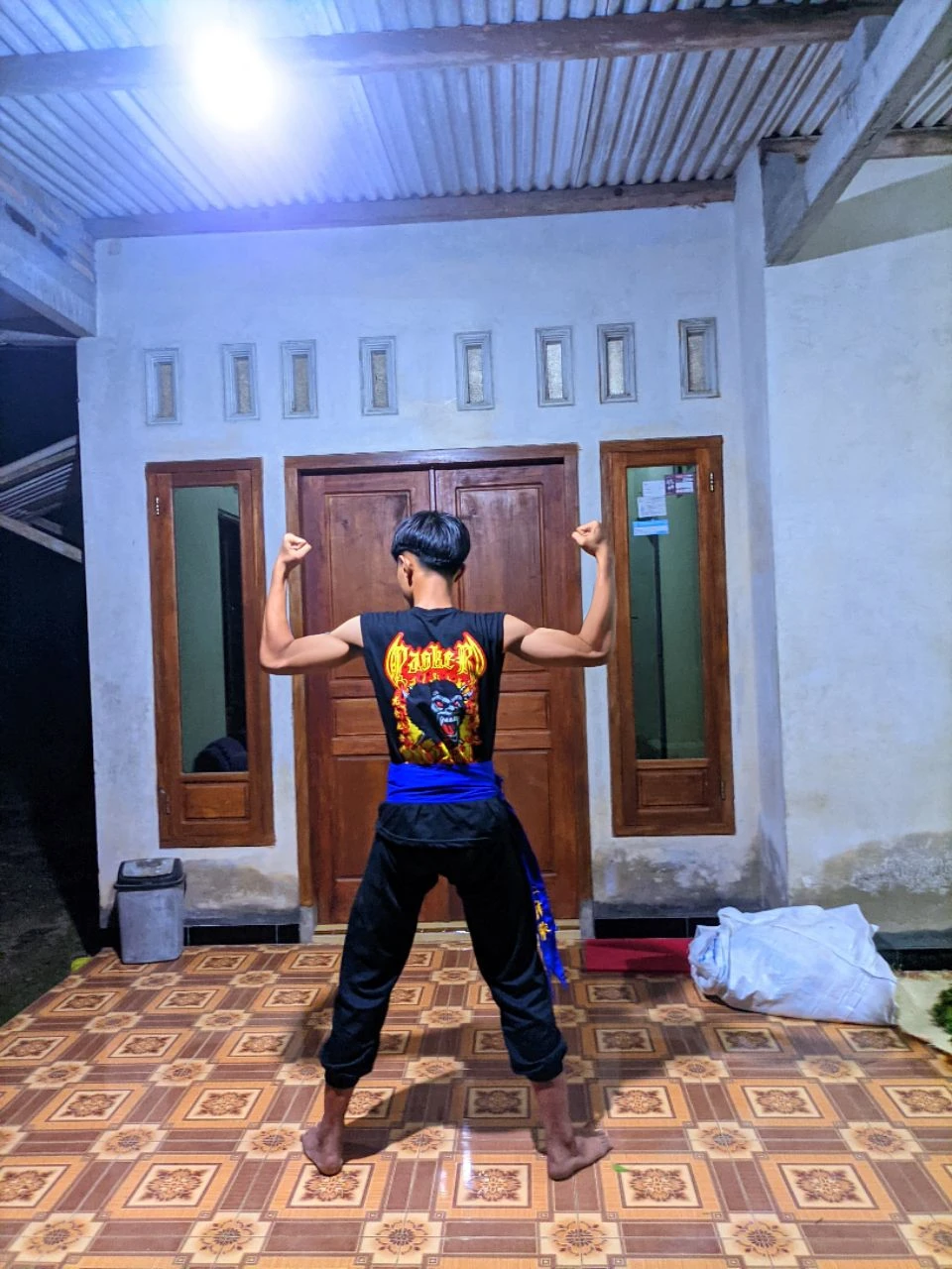 (Masterpiece, Best quality, 18 year old boy, 8k, ultra-detailed), (underneath, looking away, upper body, warm eyes, thin lips), 1 boy, solo, Young, (teenager), (Dark Short straight hair, under cut), black eyes, full bodyesbian, (Shirtless), topless, Green headband, sandals, (Black shorts with loincloth), (Depth of field:1.2), (Abs), (chest), (upper arms), black wristband, (topless male), man with martial arts stance, athretic body, kneeling pose, inside caves, (foggy night)