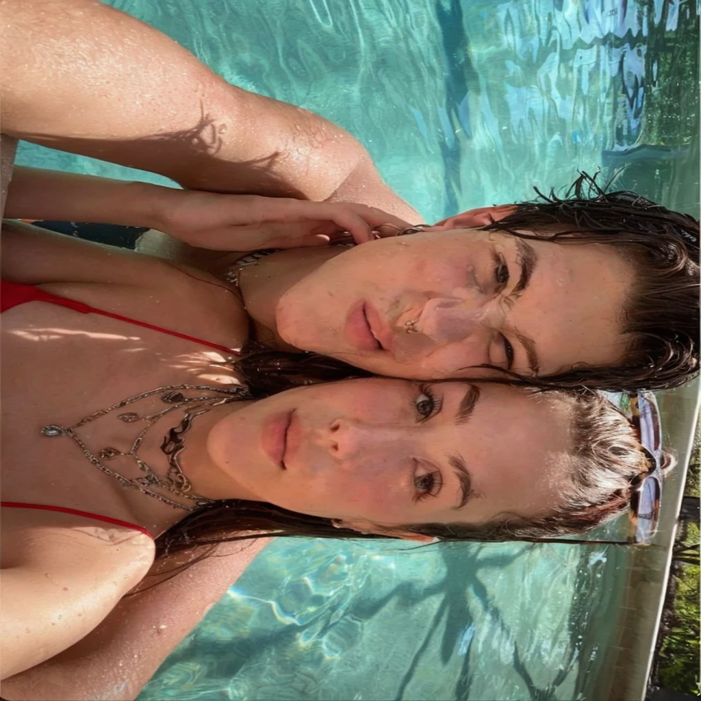they are in the pool, charli bowater and artgeem, profile pic, profile image, leaked, they are siblings, next to a pool, in a swimming pool, profile shot, charli bowater, in water up to her shoulders, in style of petra collins, taken in the early 2020s, older sister vibes, valentina remenar