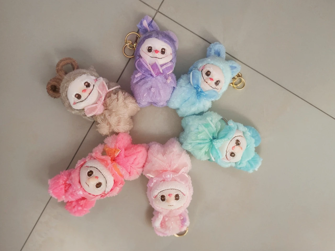 a cute keychain of labubu, extremely detailed, adorable, high-quality, 3D render, hyperrealistic, vivid colors, intricate details, soft lighting, magical background, fantasy elements, glowing crystals, floating islands, ethereal atmosphere, dramatic lighting, mesmerizing colors, outstanding clarity, photorealistic