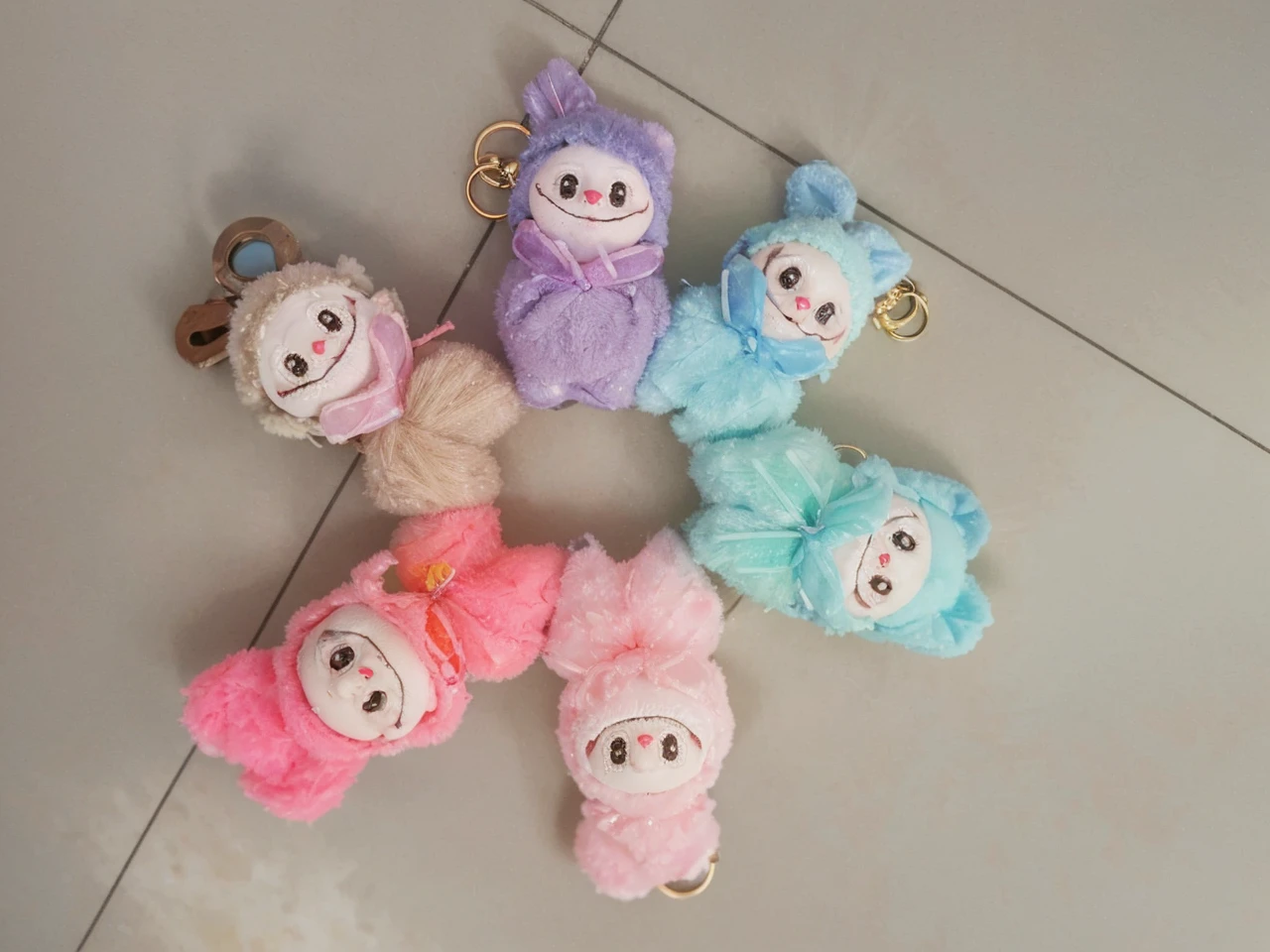 a cute keychain of labubu, extremely detailed, adorable, high-quality, 3D render, hyperrealistic, vivid colors, intricate details, soft lighting, magical background, fantasy elements, glowing crystals, floating islands, ethereal atmosphere, dramatic lighting, mesmerizing colors, outstanding clarity, photorealistic