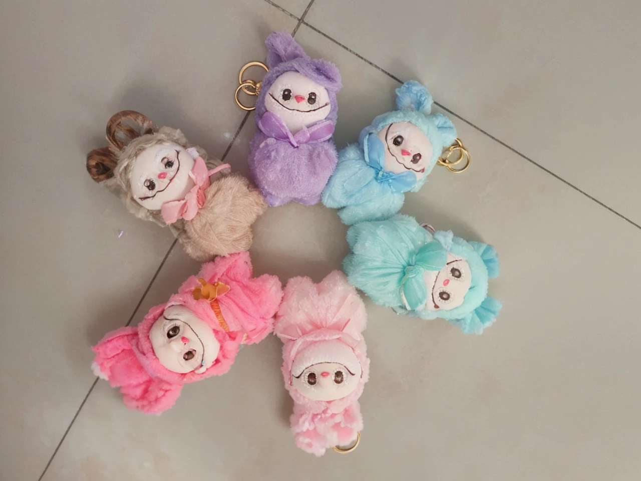 a cute keychain of labubu, extremely detailed, adorable, high-quality, 3D render, hyperrealistic, vivid colors, intricate details, soft lighting, magical background, fantasy elements, glowing crystals, floating islands, ethereal atmosphere, dramatic lighting, mesmerizing colors, outstanding clarity, photorealistic