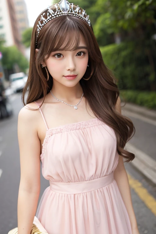 A brown-haired woman wearing a light pink dress and a tiara
