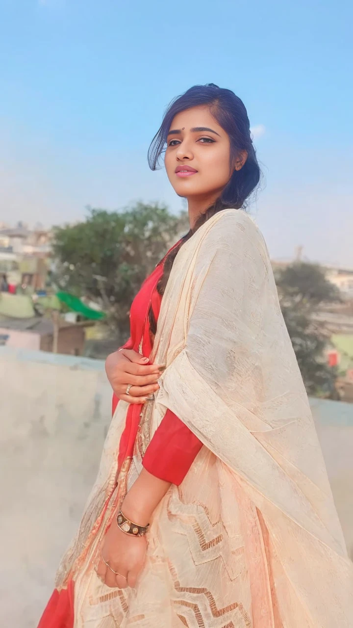 masterpiece), (best quality:1.7), (finely detailed eyes and detailed face), (detail:1.3, best quality, (ultra-detailed), (an extremely delicate and beautiful),cinematic light,dynamic angle,floating, (best quality:1.3),((disheveled hair:1.2),( beautiful detailed eyes:1.1), Indian teen girl, wearing saree , big breast , charming face , seductive pose,meadows background , bokeh , flower on hair, tight blouse buttons