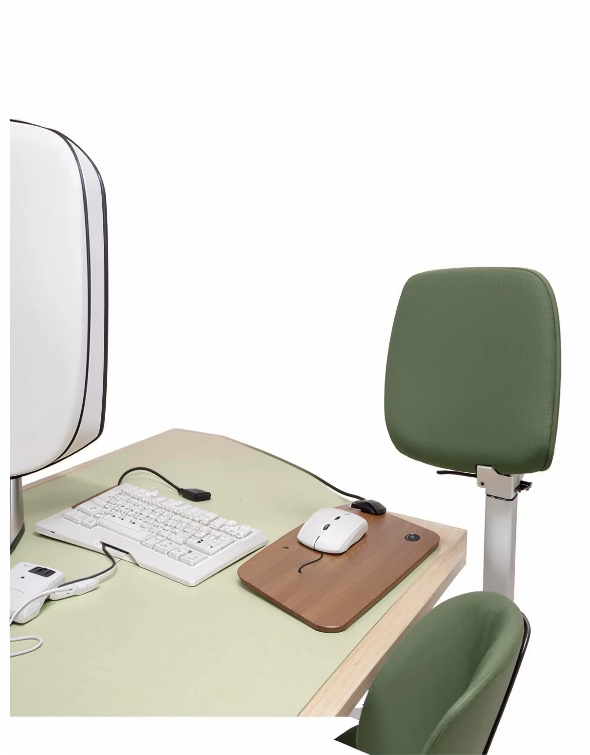an office table a monitor a green chair a keyboard and a mouse a white wooden table