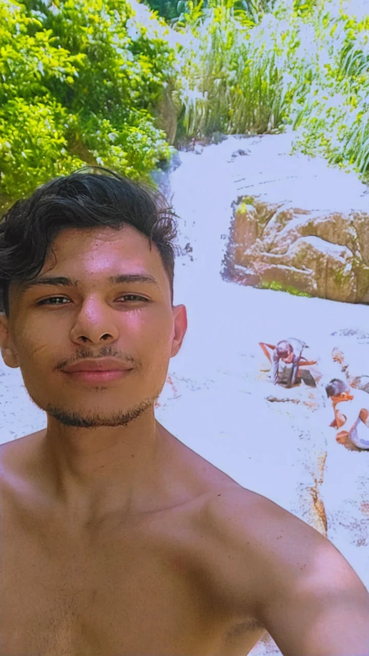 Home slim young man in the sea with small white transparent swimming trunks his body and swimming trunks are wet he has black hair and dark skin 