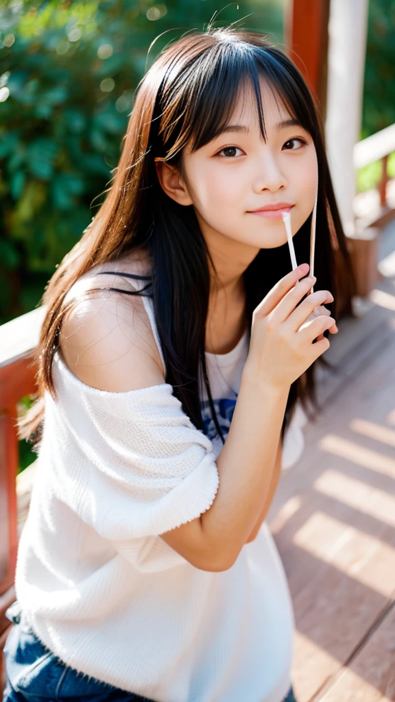 Asian girl blowing a kiss, 15 years