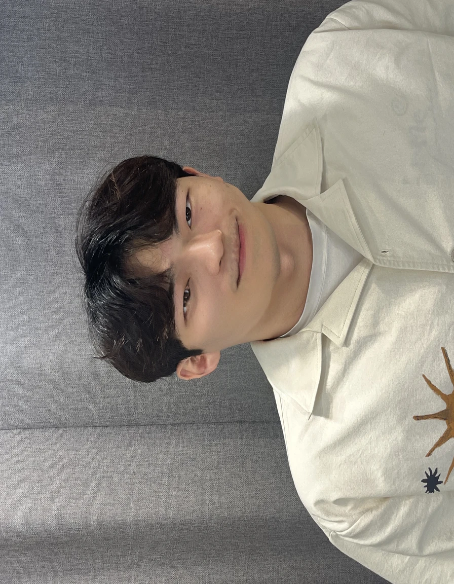 Best Quality, 8k, Masterpiece, (Portrait: 1.3), (photo realistic:1.4), (hyper realistic:1.4), Sharp Focus, looking at viewer, (smoother lighting:1.1), (increase cinematic lighting quality:0.9), realistic lighting, backlighting, light on face, ray trace, (brightening light:1.2), (Increase quality:1.4), sharp detail, (best quality real texture skin:1.4), finely detailed eyes, black_eyes, finely detailed face, 25 year old Korean man