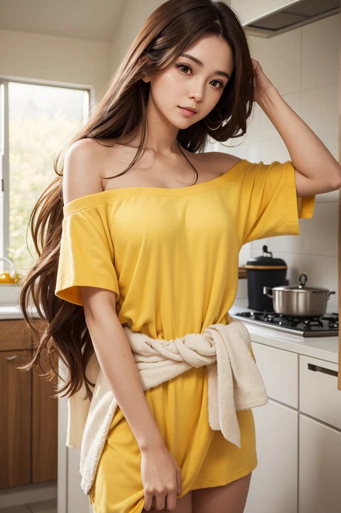 Woman with long brown hair with a towel around her waist wearing a yellow shirt inside a kitchen