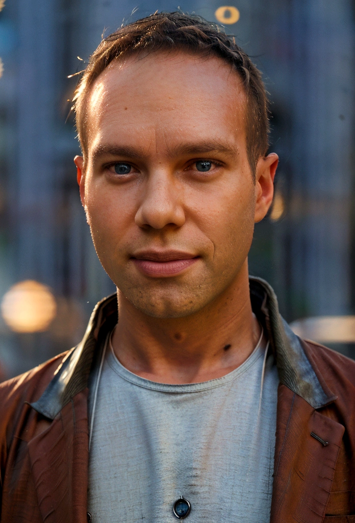 Todder8 Portrait photo of a handsome male full body photo, perfect eyes, wearing a shabby mecha coat, ((light bokeh)), intricate, (steel metal [rust]), elegant, sharp focus, photo by Greg Rutkovsky, soft lighting, bright colors, masterpiece, (street)), detailed realistic face, close-up of the face, Todder8, Todder5