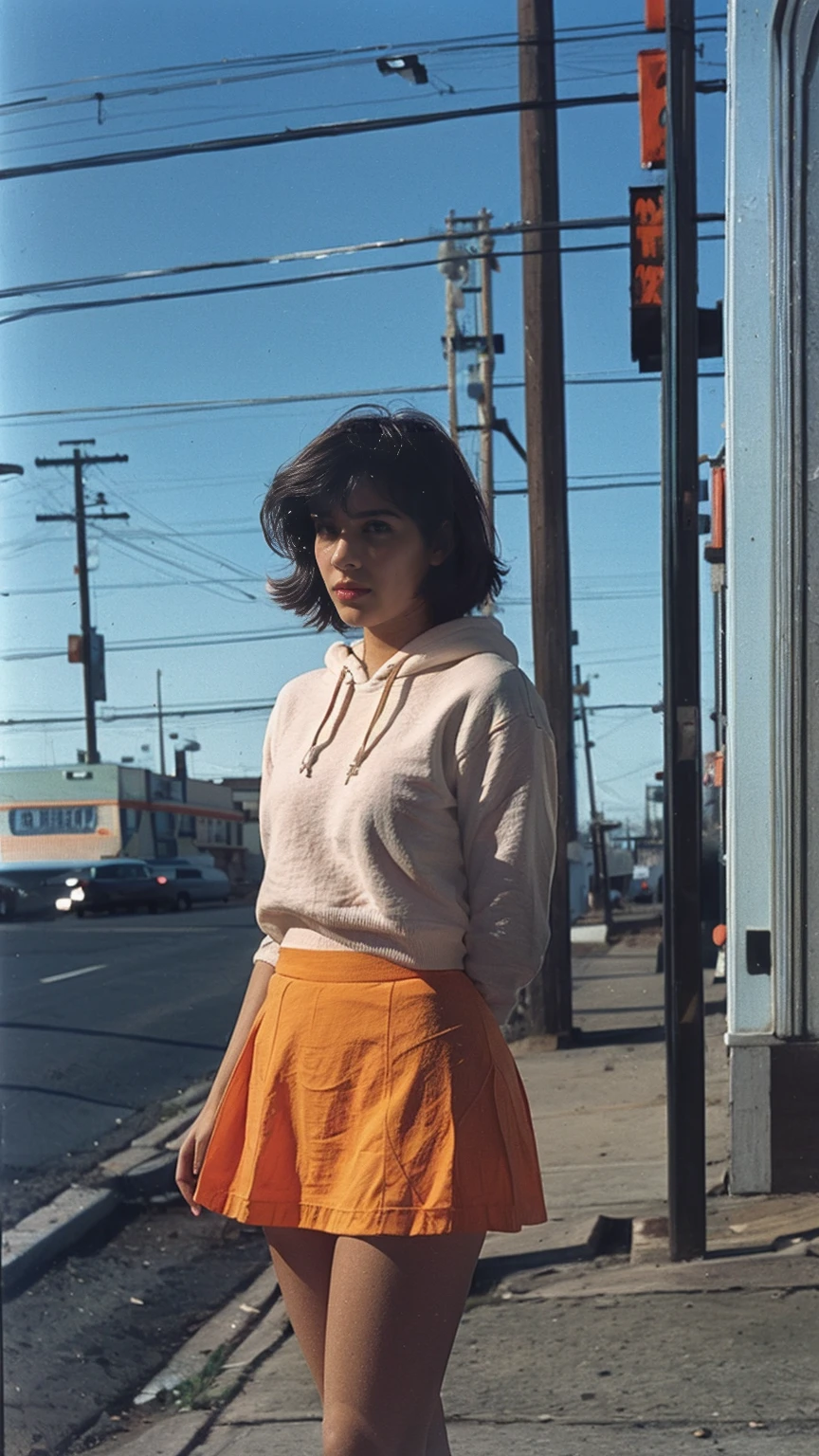 portrait of a serious 23 yo girl, plum body ,wear ((orange color oversized hoodie)), wear ((purple tennis skirt)),looking front,Best Quality,Masterpiece,Ultra High Resolution,(Realisticity:1.4),Original Photo, 1Girl, light leak,ultra high resolution,UHD,beautiful, (black bob hair), almond eye, no makeup, in front of (80's mondrian architecture motel), (realistic:1.2), (surreal:1.3), (very detailed:1.1), ((masterpiece)),summer, blue sky, palm trees,sunny, los angles vibes,film camera, 800mm lens,style of Philip Lorca diCorcia