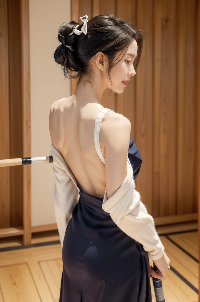 (((best quality))),(((ultra detailed))),(((masterpiece))),illustration,1girl,solo,short ponytail,slim,thin,((shoulder off,bare back,towering hips,butt crack)),white kendogi,three-quarter sleeves,maxi navy-blue kendo hakama,standing in kendo gym,(holding a bokuto in hand:1.3),arms behind back,focused and determined expression,ready for challenge,slender and elegant face,confident and resilient,fair skin,blush,neat teeth,bright smile,clean and tidy uniform,wooden gym floor,wall,pine scent,standard grip,ready to slice through obstacles,strong belief,determination,spirit of resilience,admiring,((from back,upper body))