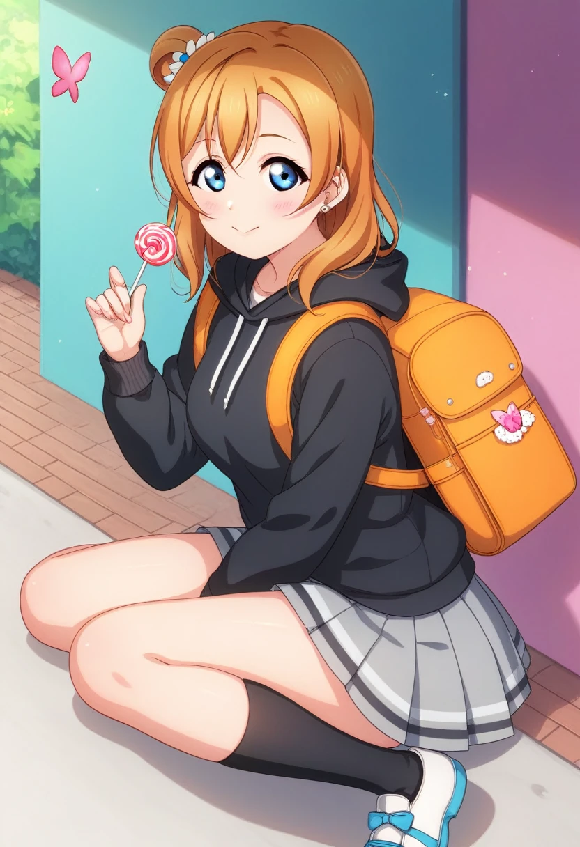 Honoka kousaka love live, blue eyes, orange hair,hair flower, perfect eyes, Perfect iris，Perfect skin，Soft front light,low twintails, curvy thicc body , Long hair , blushing, looking_at_viewer, short_hair, skirt, long_sleeves, holding,  sitting, closed_mouth, blue_hair, pleated_skirt, food, shoes, socks, hood, miniskirt, bag, black_footwear, hoodie, backpack, hood_down, bug, holding_food, black_socks, butterfly, candy, grey_skirt, lollipop, black_hoodie, blue_butterfly, holding_lollipop