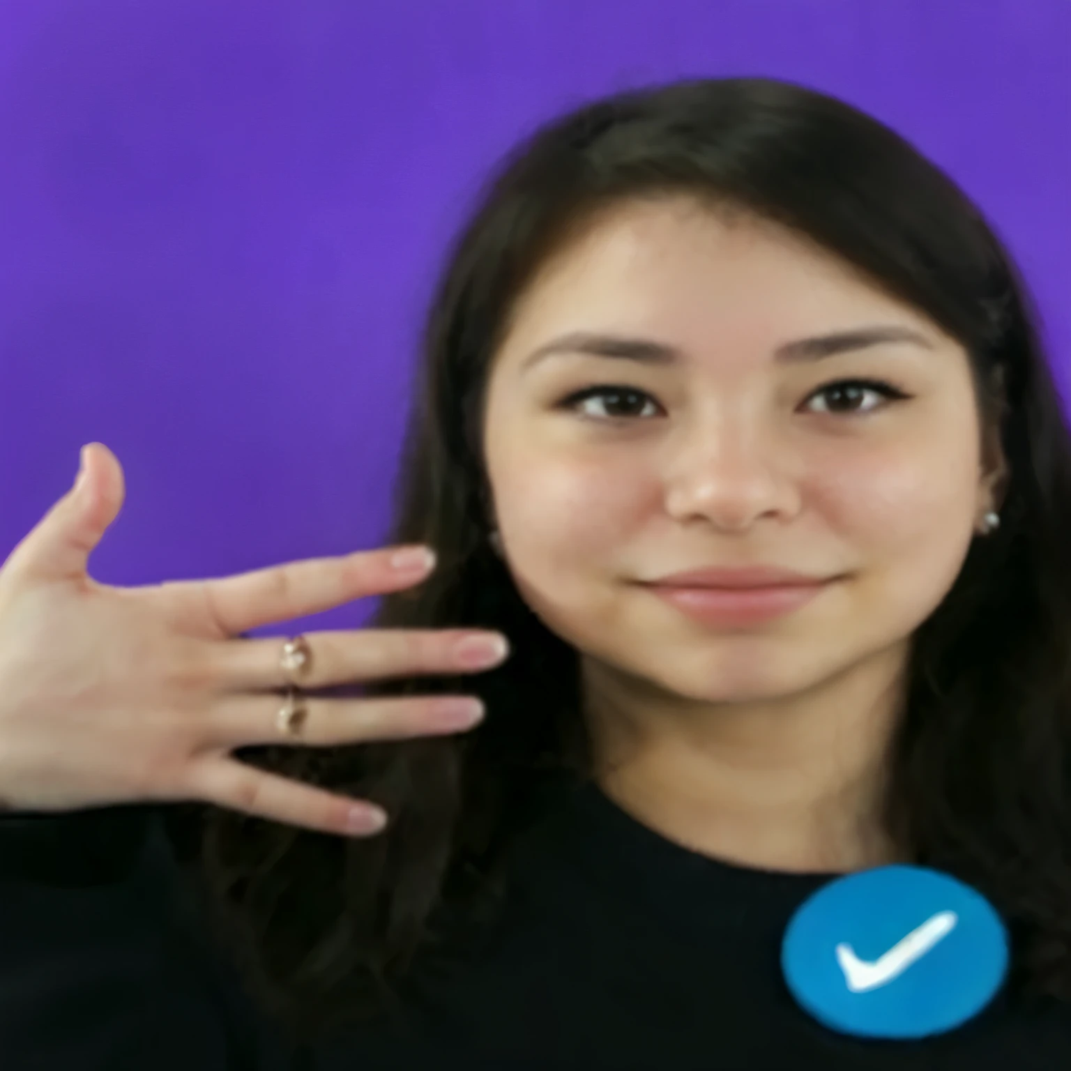 arafed woman making a face with her hands and fingers, hand gesture, hand gestures, hand on cheek,  hands visible, slightly round chin, bump in form of hand, wave a hand at the camera, corrected hand, headshot profile picture, hand instead of a face, point finger with ring on it
