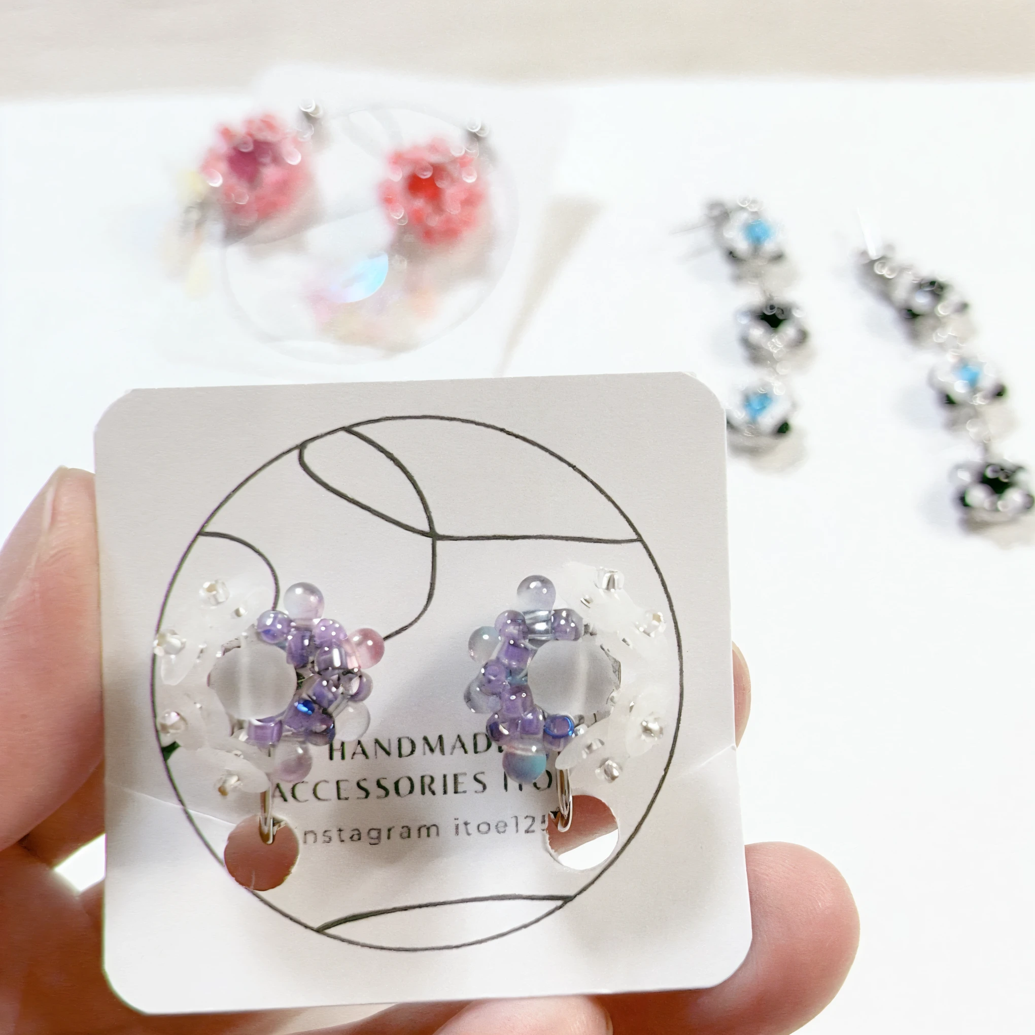 A woman wearing these earrings