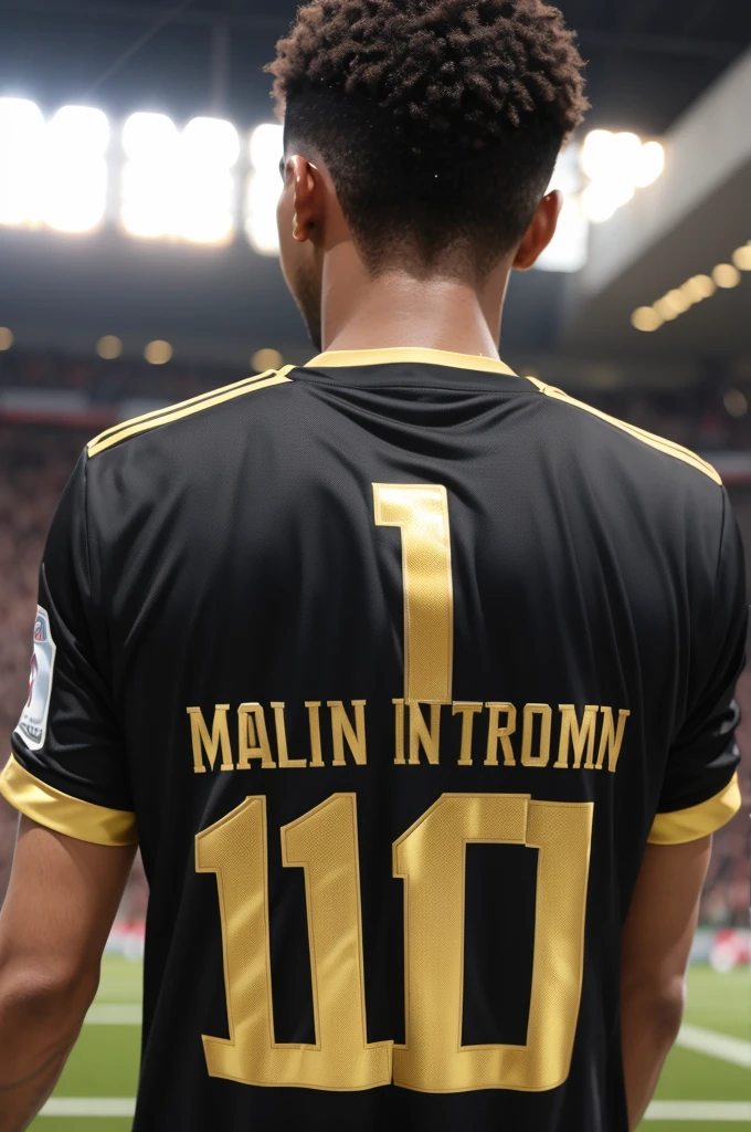 Make me turn my back, with a black football shirt with gold, with the name David on top, and the number 10 below