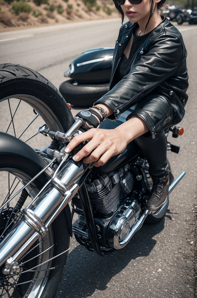 Hand dirty with motorcycle grease, with a broken motorcycle chain