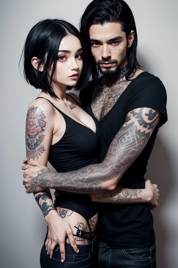 A couple hugging he is tall tattoed with short black hair, she is short with long black hair, septum piercing and some tattoos