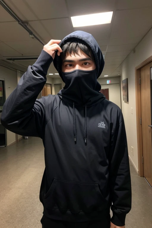 A man standing with his head covered in a pose for a photo with distortion