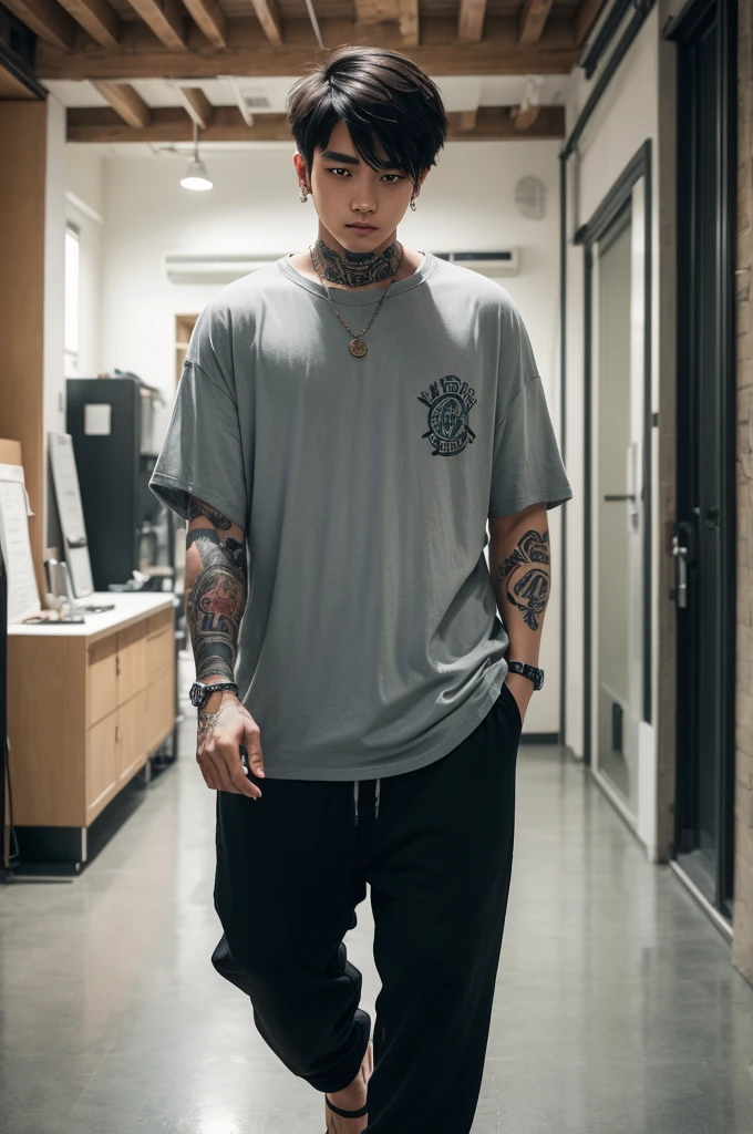 A guy with short hair to the side, wearing loose clothes, a shirt and size 43 pants, with a tattoo on his arms, twirling a coin between his fingers