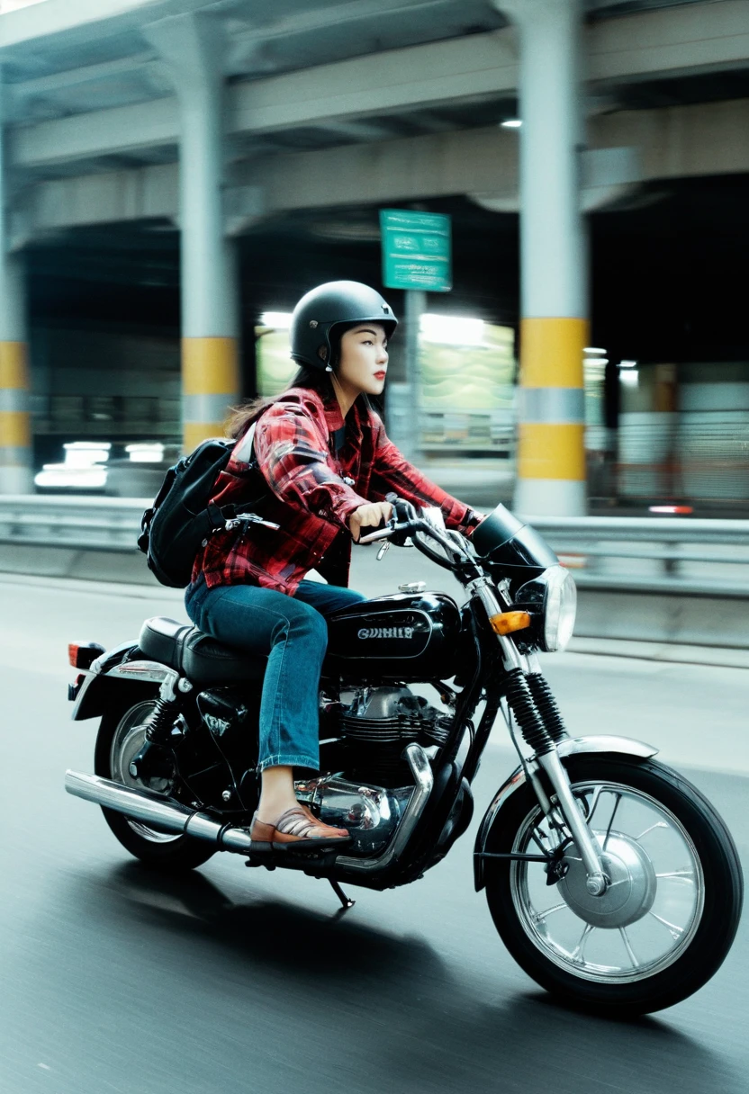 Create an image of two individuals riding a motorcycle. The male in the front should be wearing a dark half helmet, a flannel shirt, and dark gloves. The motorcycle should have a classic design with round headlights and rearview mirrors on both sides. The young female in the back is wearing white shirt and dark skirt with a light-colored open face helmet, and carrying a black backpack with straps over both shoulders. She should be seated behind the first rider, hugging onto the male for stability. The setting is a street under a tunnel at night with dim yellow street lighting casting shadows and creating a moody atmosphere. The camera angle is from the front  capturing the motion of the motorcycle as it moves. Wong Kar Wai color palette