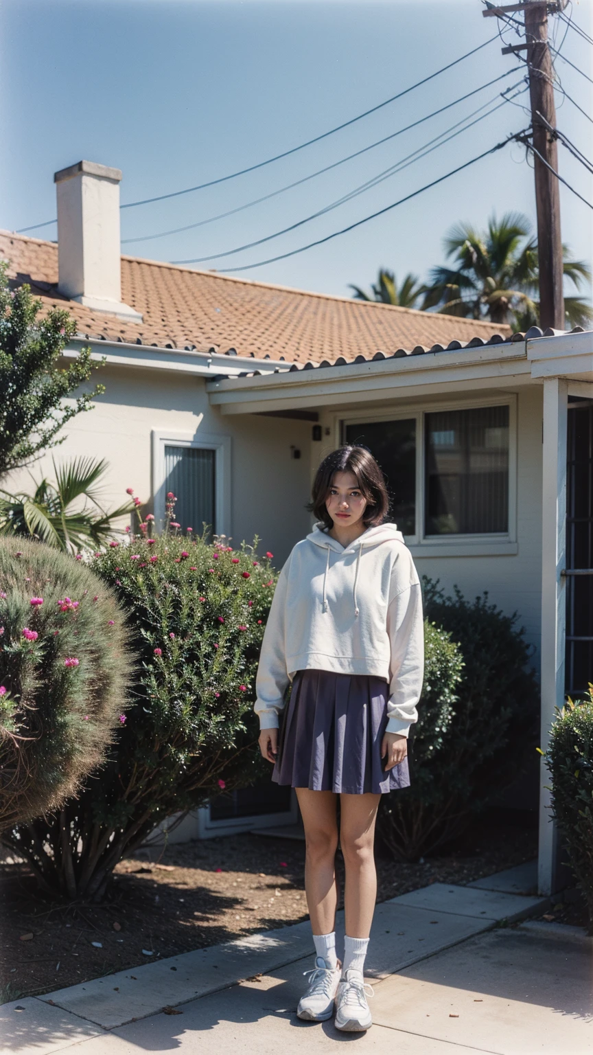 long shot portrait of cute 23 yo girl, happy body shape ,wear ((orange color oversized hoodie)), wear ((purple tennis skirt)),looking front,Best Quality,Masterpiece,Ultra High Resolution,(Realisticity:1.4),Original Photo, 1Girl, light leak,ultra high resolution,UHD,beautiful, (black bob hair), almond eye, no makeup, in front of (80's mondrian architecture motel), (realistic:1.2), (surreal:1.3), (very detailed:1.1), ((masterpiece)),summer, blue sky, palm trees,sunny, los angles vibes,film camera, 800mm lens,style of Philip Lorca diCorcia