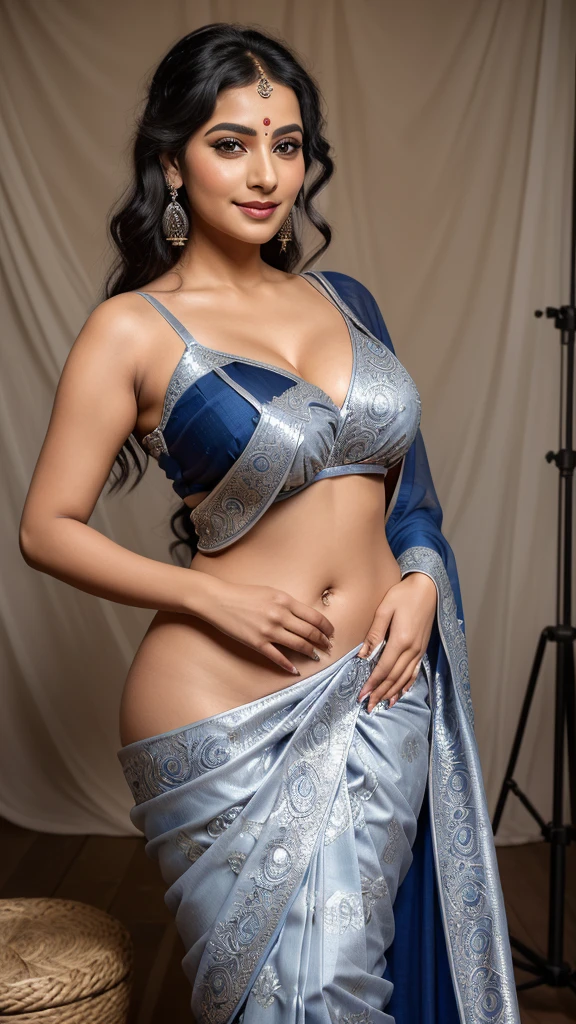 A beautiful Indian woman with the grace and elegance of an Indian goddess, showcasing her exquisite beauty and seductive charm. She is dressed in a traditional saree and blouse, but with a new twist in color and design. The saree is a deep royal blue with silver embroidery, tightly wrapped around her waist, ensuring it covers her waist and thighs completely. The blouse is a contrasting silver with detailed blue patterns, adding a modern touch to her outfit. Her large breasts and big cleavage are prominent, adding to her seductive allure. Her curvy body and saggy breasts are depicted with realistic body details, making her appearance exceptionally lifelike. Her glowing face and lips, smooth skin, and realistic skin texture enhance her overall beauty. She has extremely detailed eyes, adorned with eyeshadow, eyelash, and eyeliner, adding depth and expression to her gaze. Her navel is visible, adding to the sensual appeal of the image. Her beautiful face, with its perfect nose, eyes, and lips, is captured with intricate facial details. She has a cute face and is smiling softly, exuding warmth and charm. The photograph is a full-body shot, taken in a photo studio with 8K resolution, making it a masterpiece of the highest quality. The setting is rural, adding a touch of rustic charm to the overall composition.