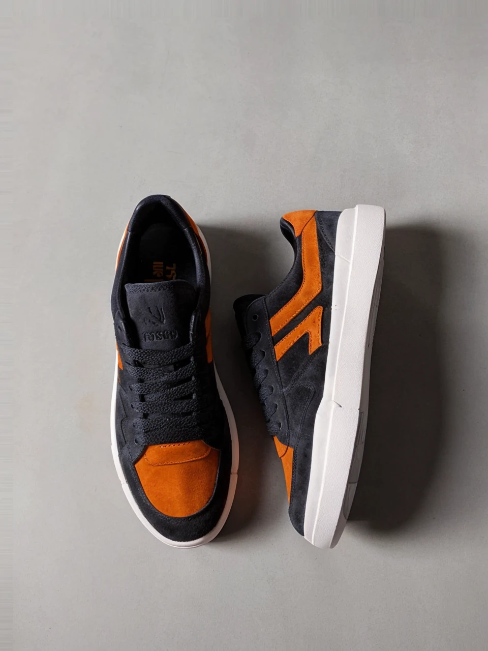 Suede sports shoes