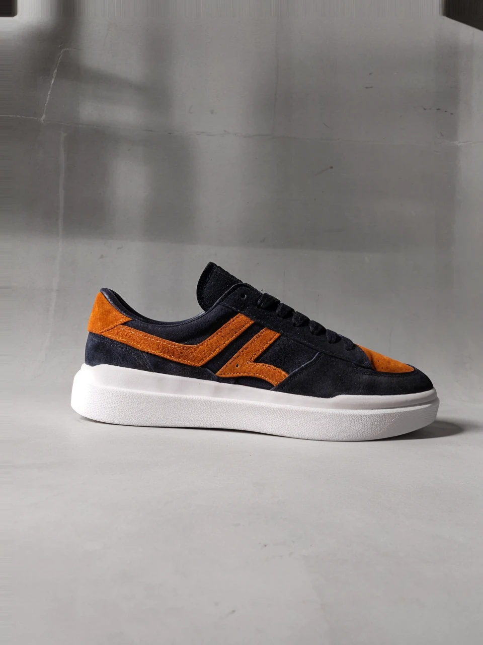 Suede sports shoes