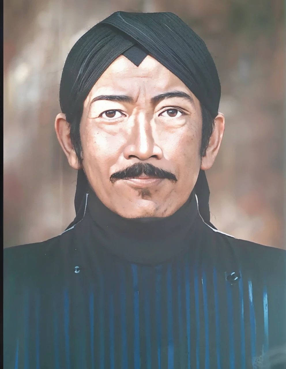 Indonesian Muslim man, aged 40 years or above, brown skin with wrinkles on the forehead, wearing Javanese ethnic clothing, thick mustache, slightly narrow eyes, realistic HD