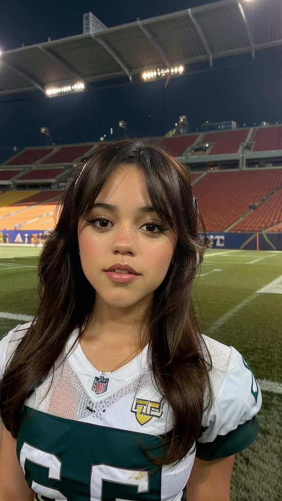 jenna_Ortega she watching the game from a football stadium