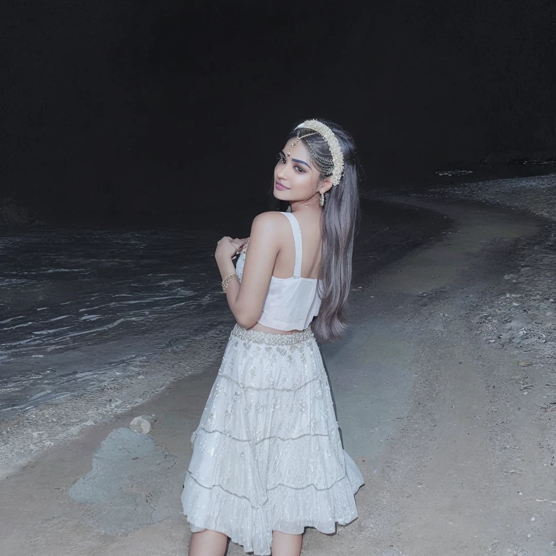 (best quality, ultra-detailed, realistic:1.37), professional, beautiful detailed eyes, beautiful detailed lips, detailed facial features, natural skin tones, perfect skin texture, delicate facial expressions, image in high resolution, realistic face, realistic skin, plain face, natural smile, highly detailed hair, 20 years, (Kiran, beautiful Indian young woman), radiates Pink bridal glamour in an exquisite Lehenga Choli adorned with intricate embroidery and ornate jewelry. Cute feet in golden high heel sandals. The high-resolution image captures ultra-detailed realism, highlighting Kiran's captivating eyes, expressive lips, and graceful facial features, enhancing her bridal beauty. The soft lighting and floral decorations create a visually stunning representation of traditional Indian weddings and the joyous celebration of love, Beautiful background.