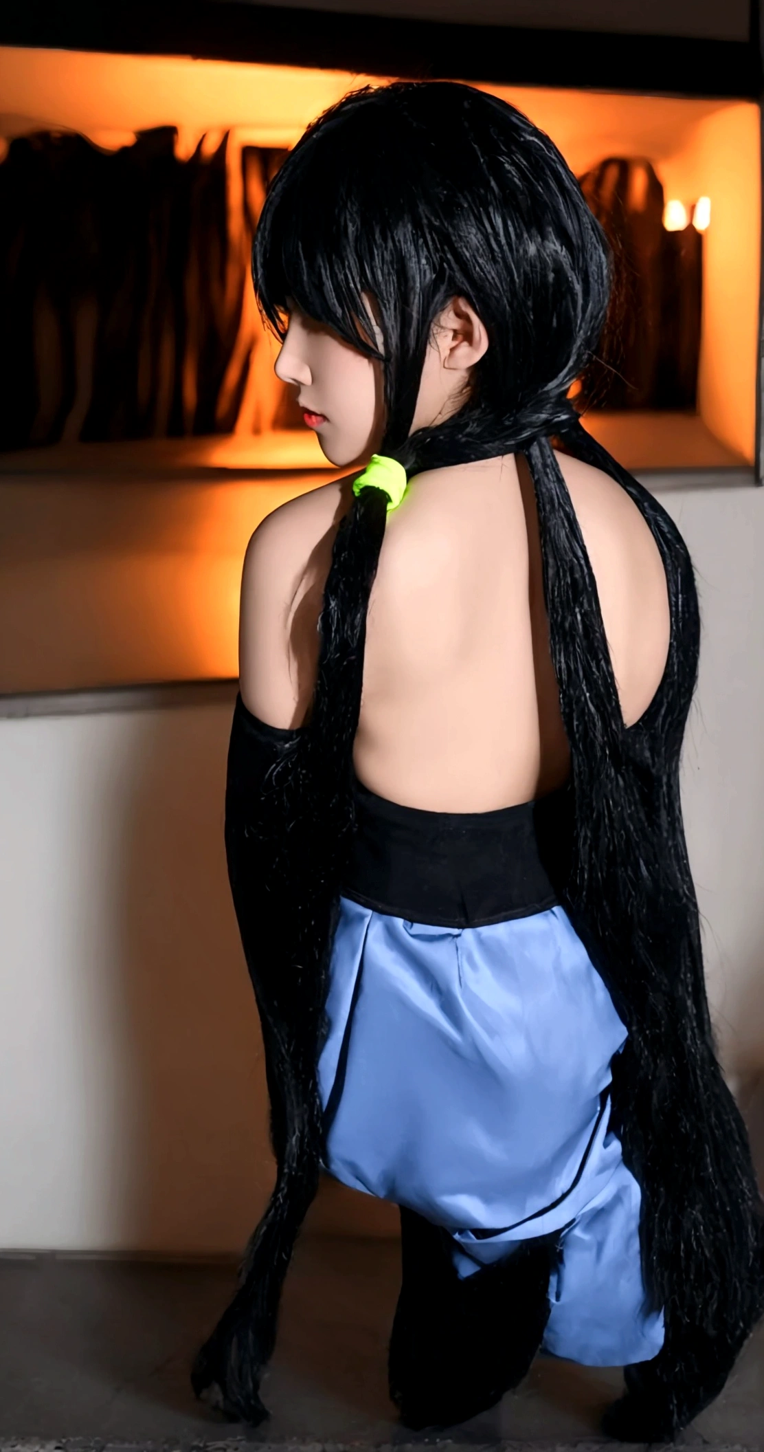 (top-quality, 8K, masterpiece:1.3) A photo of vibrant,
tokisaki kurumi, heterochromatic eyes, right red eyes, left yellow eyes, black hair, long hair, twintails, asymmetrical twintails,(hands behind back:1.3),
wearing a neon pink off-the-shoulder sweatshirt, high-waisted acid wash jeans, and white Keds,
standing in front of a retro-futuristic cityscape at dusk, with neon lights reflecting off the wet pavement,
taken with cowboy shot, portrait mode, highly detailed, detailed skin,
dramatic, warm, and moody neon-lit lighting with a hint of fog.