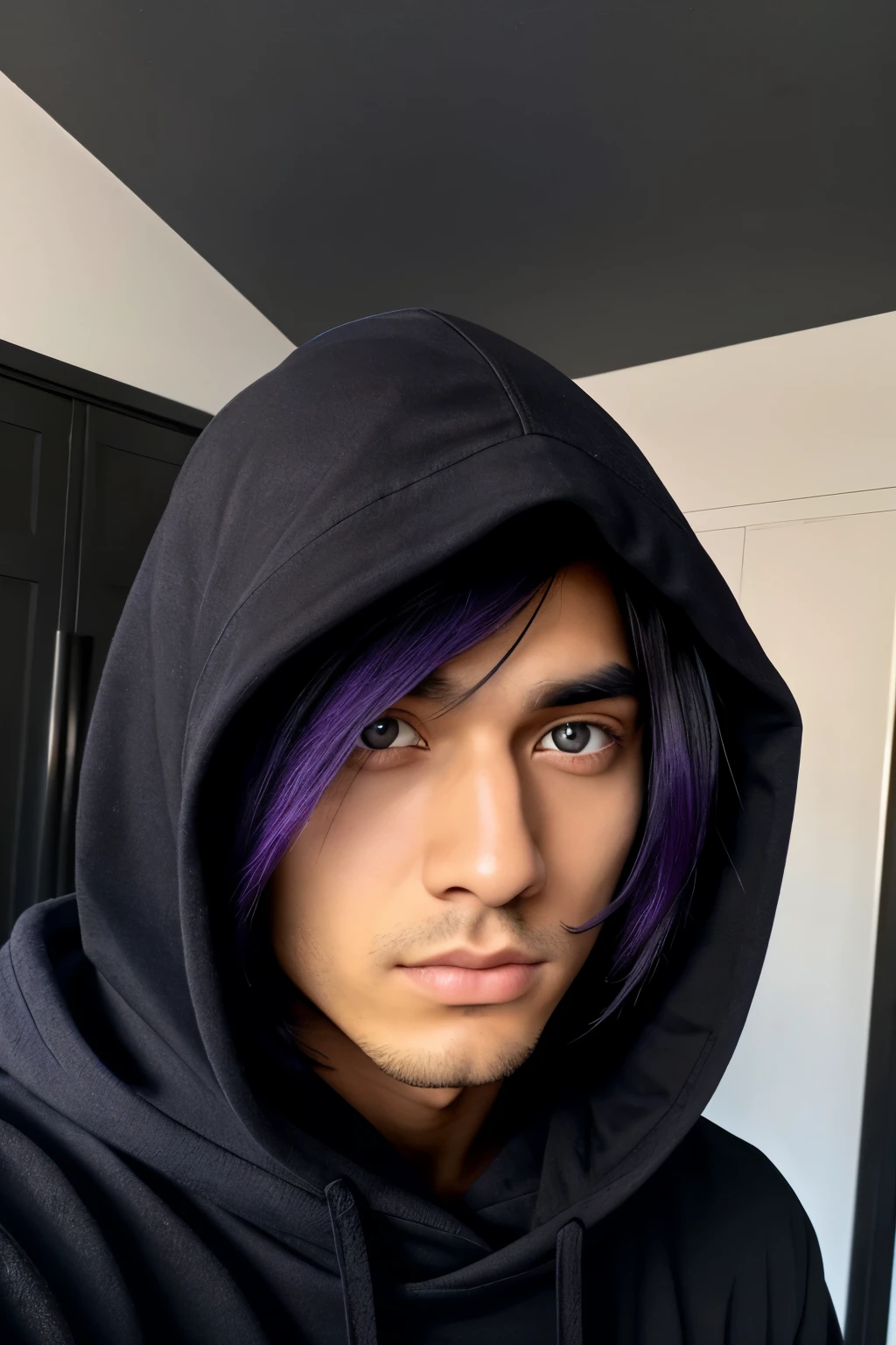 A stunning black haired man whos eyes are practically covered with his hair. With two diffrent colored eyes; one blue and one purple. Hes wearing a black hoodie and black plain mask.