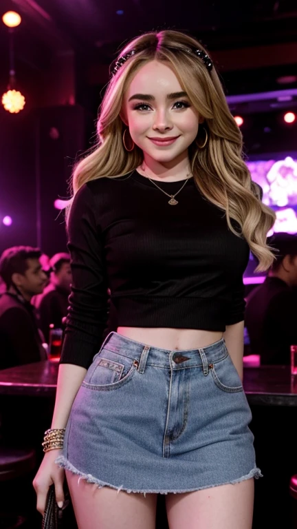 Sabrina Carpenter dressed in neon colored bra and pants with a smile