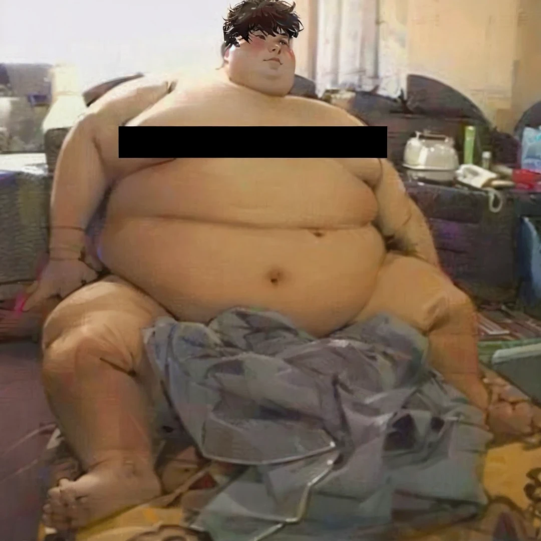 Obese boy sitting on a sofa.