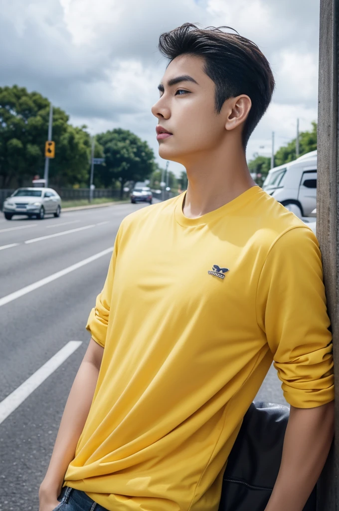 A young man in a yellow shirt stood on the side of the road with a serious expression., looking into the distance,Eyebrows frowned.,He looked worried.,Turn your head slightly.,Cloudy day, coffee shop