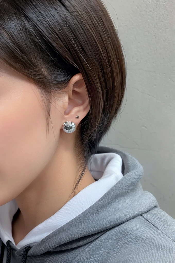 1girl, front face, short mullet_hairstyle, hair down, blunt_bangs, Black_bangs、The sides and back of the hair are blonde, wearing Black-rimmed under-rimmed glasses、black_eyes、wearing a space patterned hoodie、Three simple silver ball piercings in the right earlobe、Two piercings in the cartilage of his right ear、Two simple silver ball earrings on the left earlobe