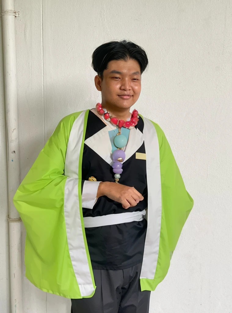 Gyomei wears a traditional Japanese kimono with a long, flowing white robe.
Over the kimono, he dons a sleeveless haori (a traditional Japanese jacket) that is primarily dark green with a geometric pattern.
Belt (Obi):
He wears a wide, dark belt (obi) that secures his kimono and haori.
Beads and Rosary:
One of his most distinctive accessories is a large rosary necklace made of prayer beads, which he often holds in his hands.
Footwear:
Gyomei wears traditional Japanese sandals (zori) with white tabi socks.
Gyomei has short, spiky black hair.
His hair is neatly cut, with the spikes giving it a rugged yet orderly appearance.
Forehead Scar:
Gyomei has a prominent scar running horizontally across his forehead.
The scar is a thin, straight line that goes from one side of his forehead to the other, adding to his rugged and battle-hardened look.
