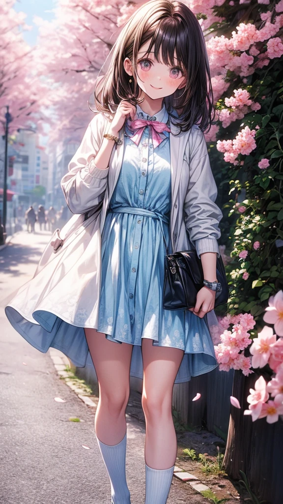 The girl is wearing a light blue cardigan over a floral frock. The frock is white with a blue floral pattern, and it appears to be knee-length. She has on black thigh-high socks and is carrying a small pink handbag. Her pose is slightly bent forward, with one hand near her face and the other holding the handbag. She has long, dark brown hair and a gentle smile, standing in a setting with blooming cherry blossoms.