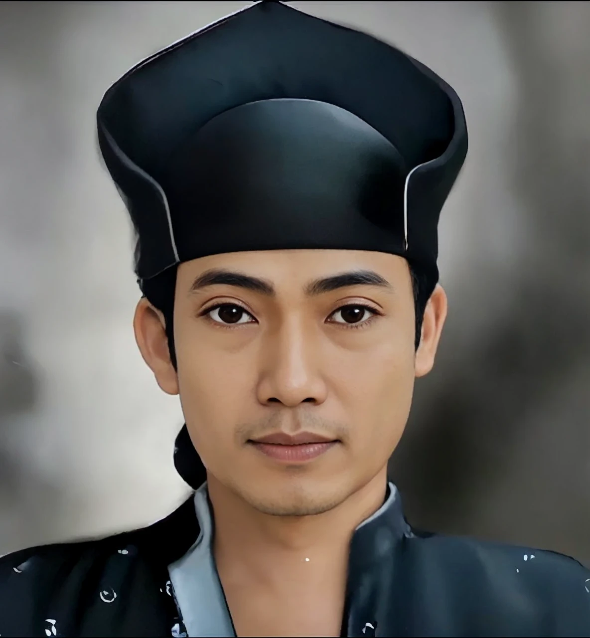 Indonesian Muslim man, wearing Javanese royal clothing and head covering, 0 years or over, clean wrinkled brown skin, clear eyes, small sharp nose, thin closed lips. HD Quality realistic images