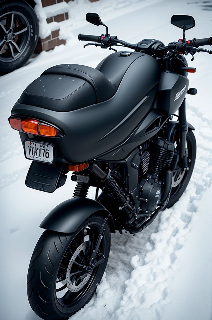 Black 1000cc motorcycle parked in the snow