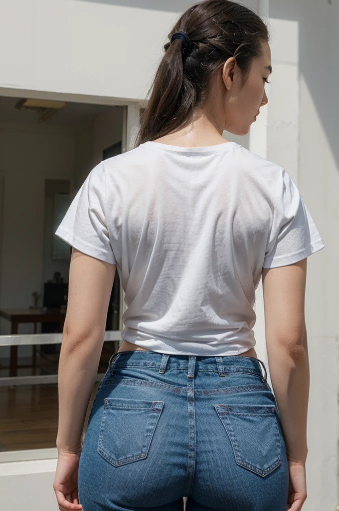 Jessica Henwick, white t-shirt, blue jeans, from behind