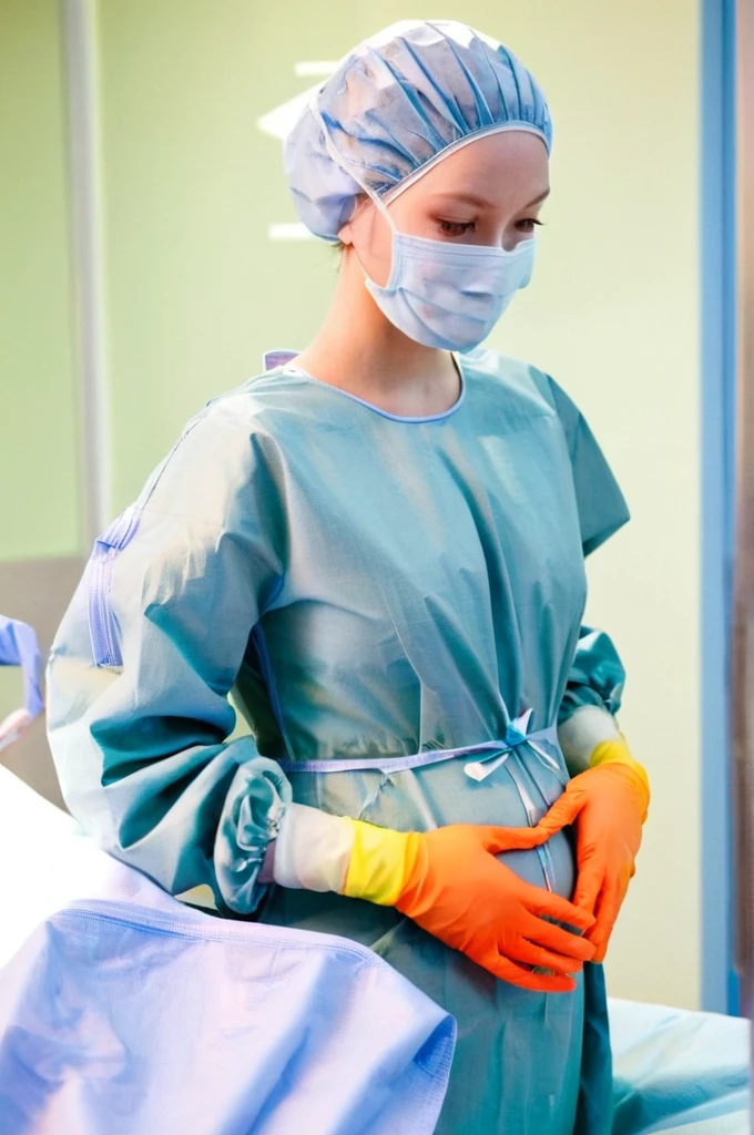 score_9, score_8_up, score_7_up, masterpiece, highest quality, pale skin, shy eyes, cover the ears, big breasts, surgical mask, surgical cap, long sleeve surgical gown, pregnant about 7 8 months,
1 girl, pregnant, solo, rubber gloves, frown, standing, in one hospital, hospital bed,