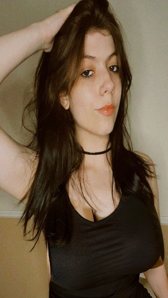 Beautiful Black-Haired Girl with large breasts bursting out of her cleavage