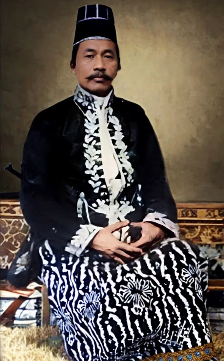 Indonesian Muslim man, aged 40 years or over, wrinkled brownish skin, wearing clothes with the nuances of a king on the island of Java, very detailed. wearing a beautiful batik sarong typical of a king, there is an heirloom keris tucked behind him, sitting on a royal wooden chair looking forward. slightly thick mustache, slightly narrow eyes, very realistic HD quality