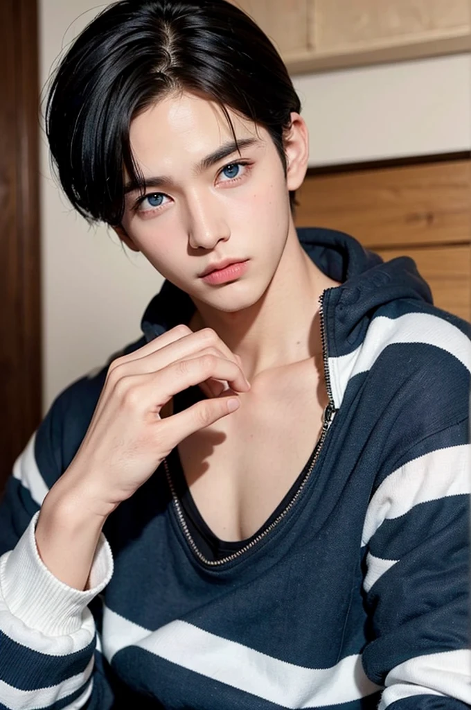 A boy in a , black hair and blue eyes very cute but also handsome 