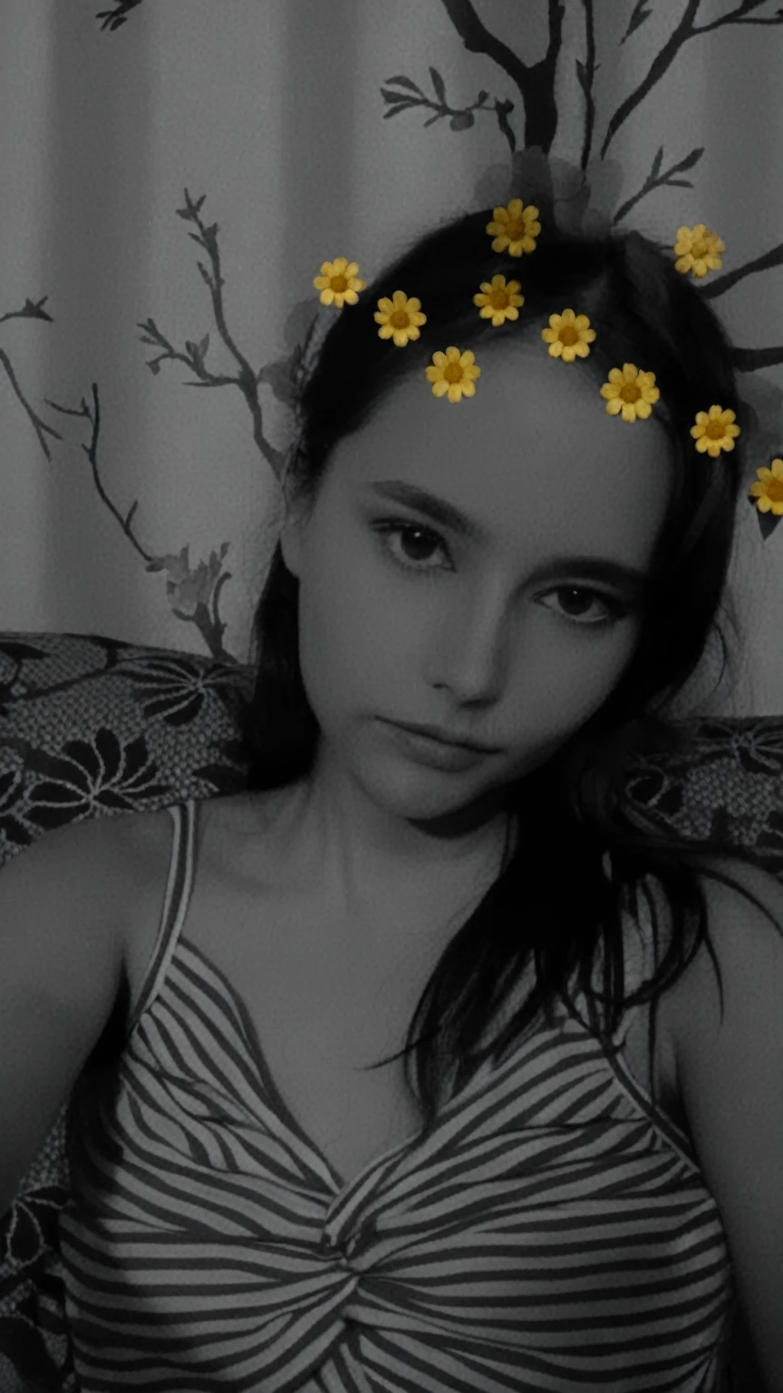arafed woman with flowers in her hair sitting on a couch, desaturated!!, black and white picture, with yellow flowers around it, with flowers, desaturated!, grainy monochrome photo, b&w photo, flowers around, with instagram filters, flowery, tumblr, (((((((no glow))))))), old picture, inspired by Yi Insang