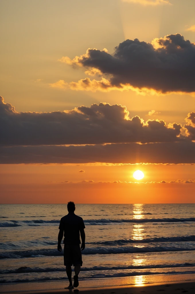 Sunset on the beach with the silhouette of a man