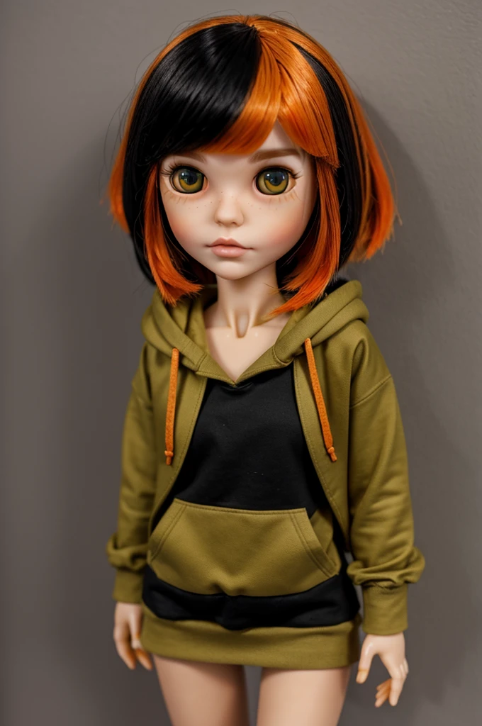 blythe doll with orange hair with black highlights and side bangs, also green eyes with brown in the middle and dressed in a black hoodie